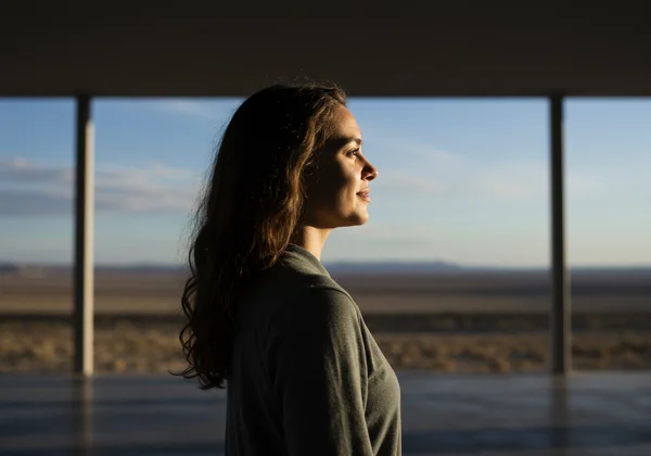 Woman finding peace and relief after self-discovery.